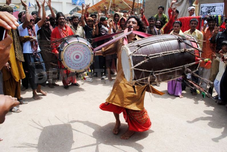 Dhamaal performers at the shrine of Shewan Sharif. Photo credit: Mutamainna Syed (http://www.dostpakistan.pk/sehwan-sharif-city-of-hazrat-laal-shahbaz-qalandar/)